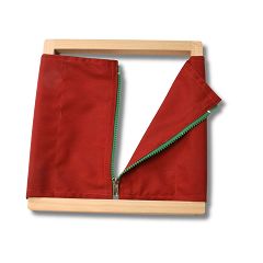 Montessori Reißverschluss üben am Motessori Rahmen Montessori Reißverschluss üben am Motessori Rahmen